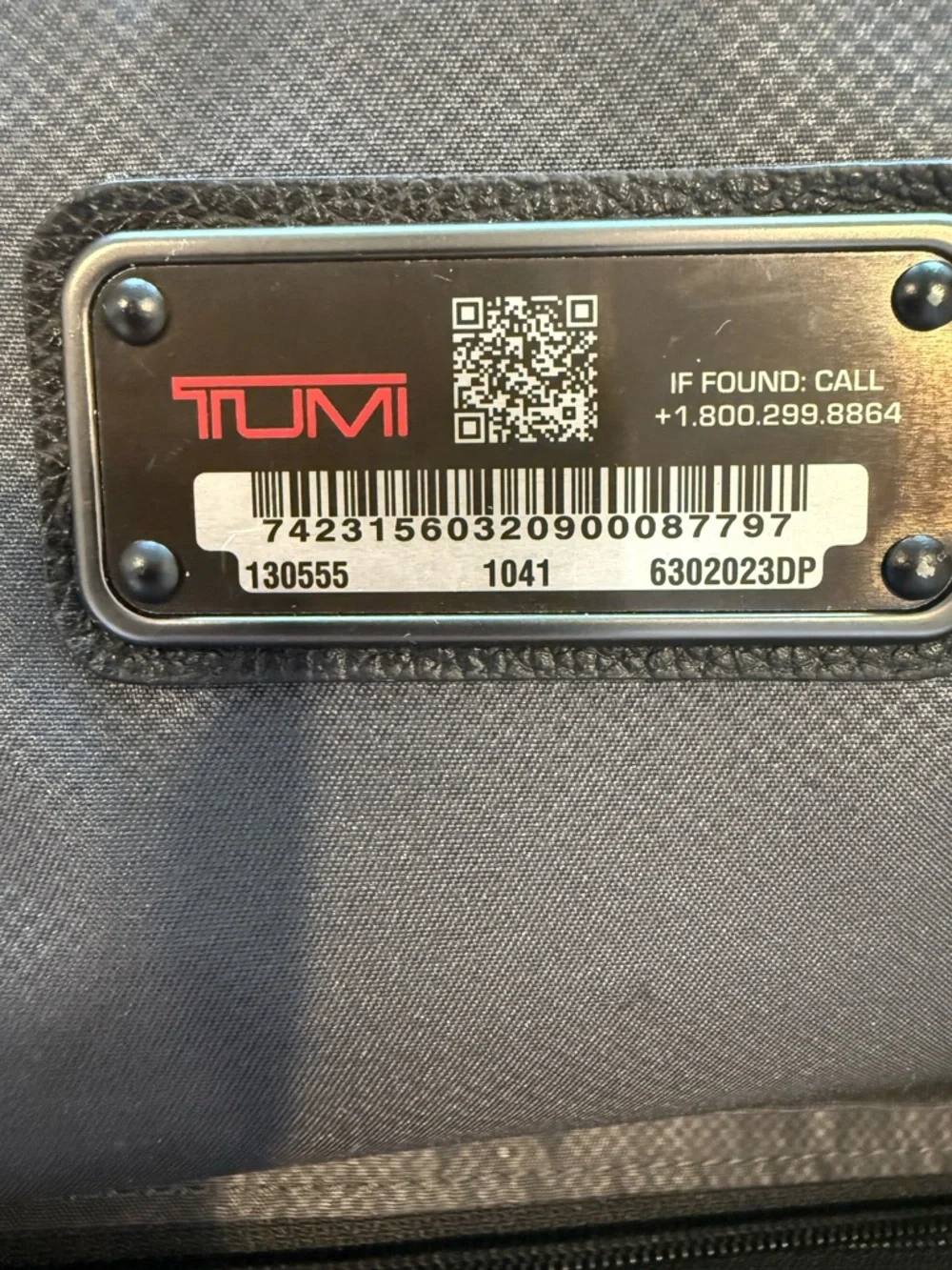 Tumi “Warren” Black Leather Backpack  Front Zip Pockets & multiple compartments!